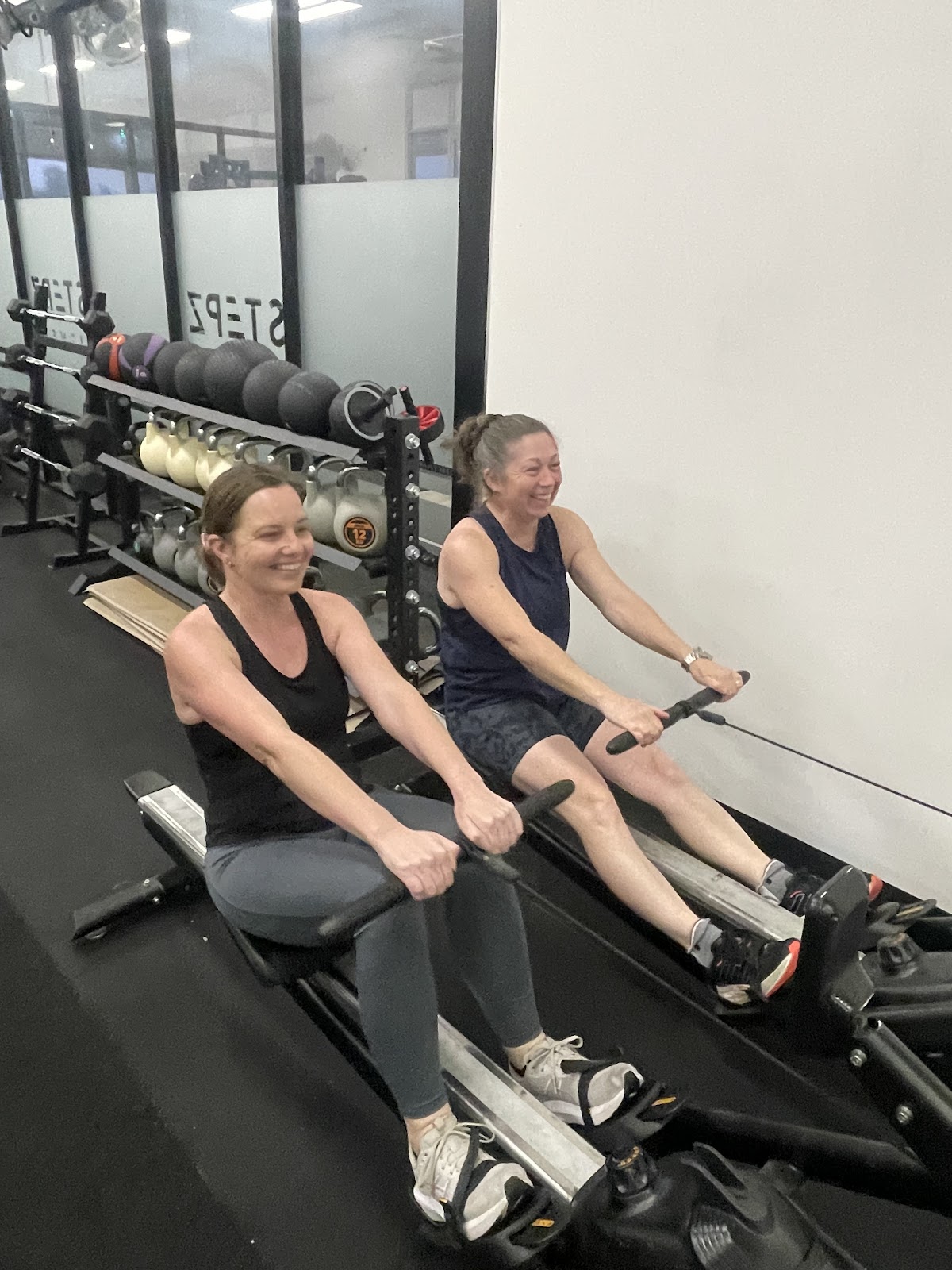 Stepz Fitness Dubbo members on the rowers